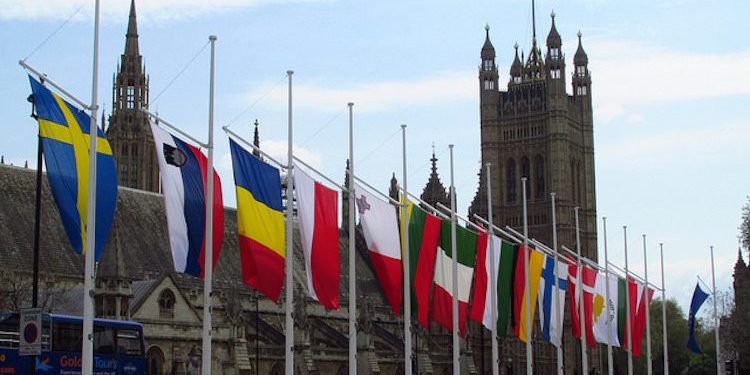 EU flags outside UK Houses of Parliament.