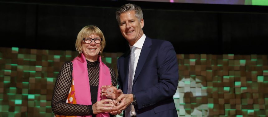Helen Zimmerman receives the Distinguished Contribution award from IDP CEO Andrew Barkla. Photo: Larry Pitt
