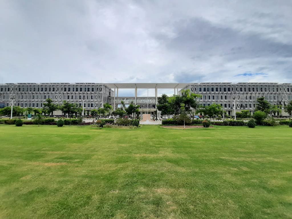 University building surrounded by grass.